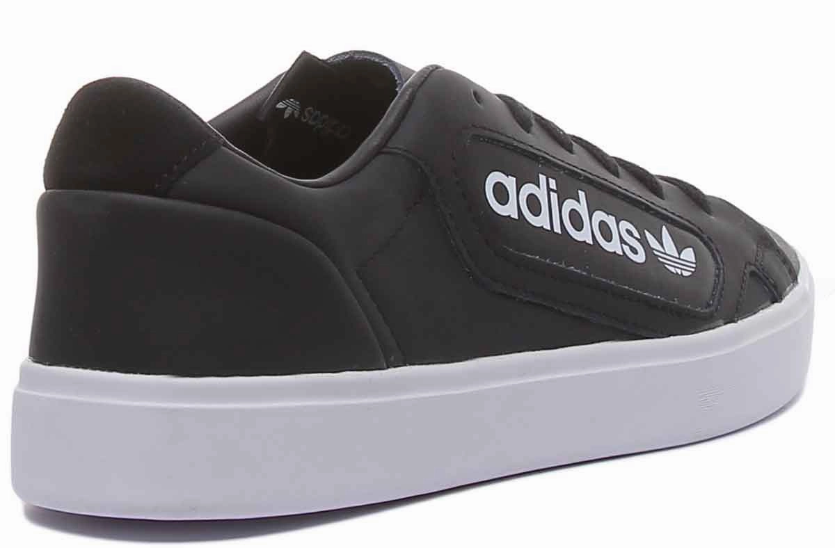 Adidas Sleek Leather Trainers In Black White For Women Impact Cushioning