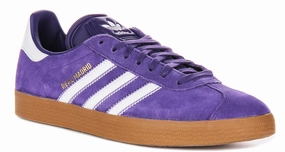 Adidas Gazelle X Real Madrid in Purple running in an estuary area shoes running in the heat